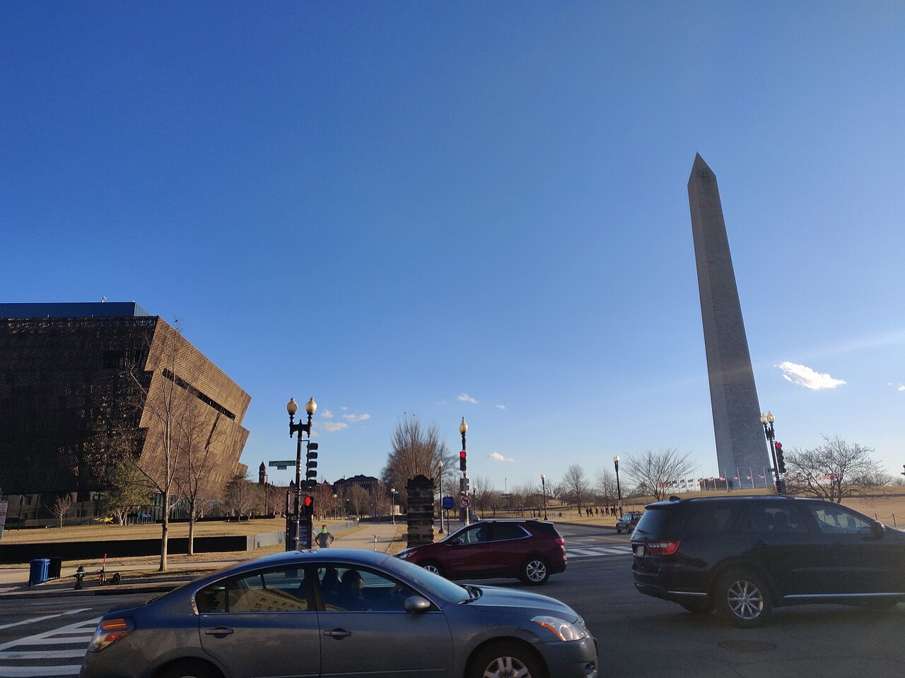 The museum's corona and the Washington Monument side by side at 15th Street