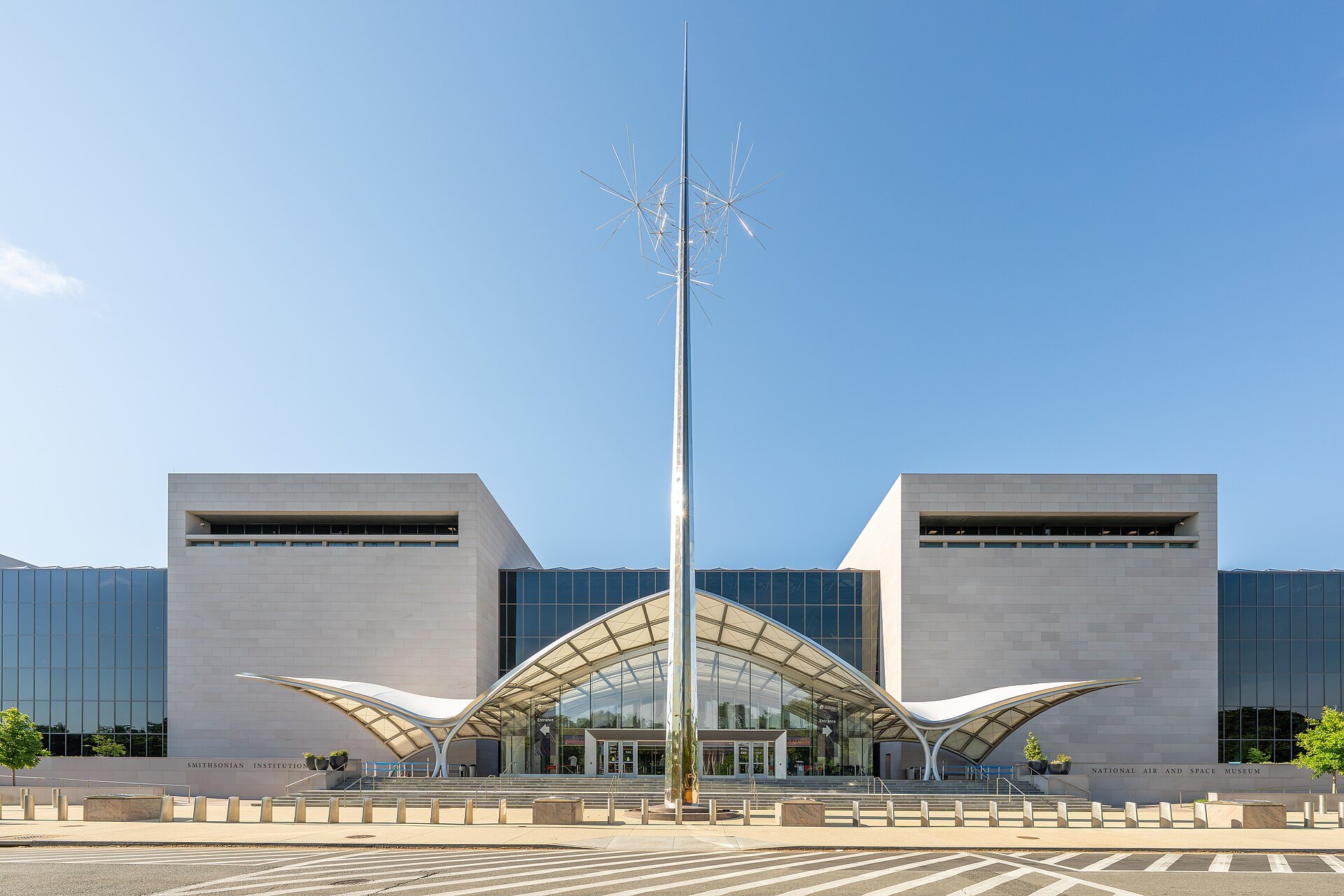 The renovated Air and Space Museum's glass entrance canopy and its steel sculpture, from the Mall