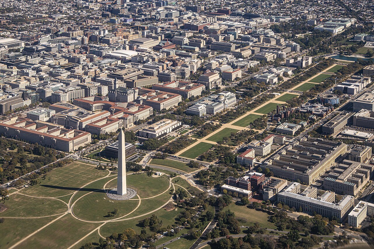 The Mall and the city north of it from the air, the Washington Monument below