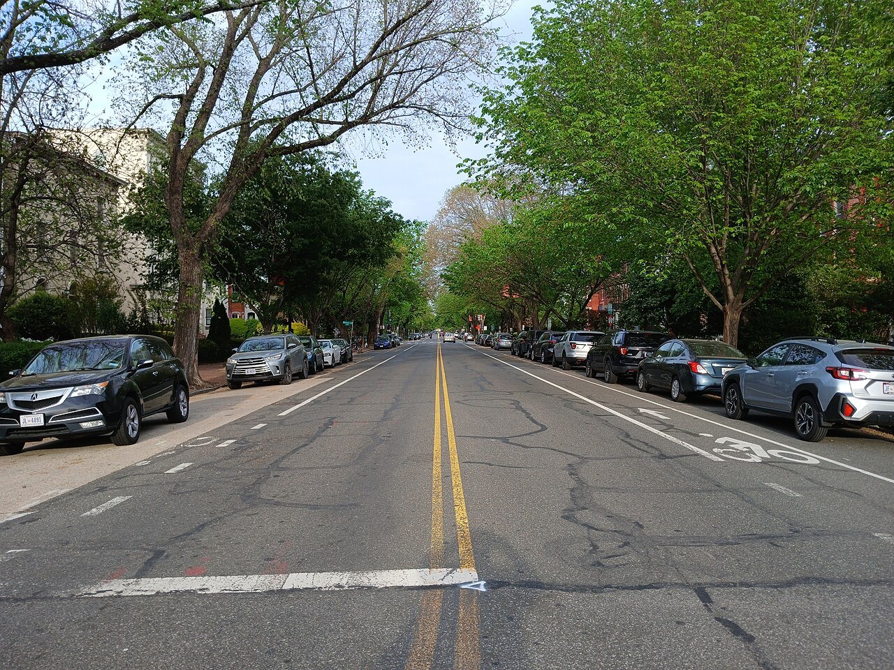 East Capitol Street running straight east from the Hill, trees along both sides