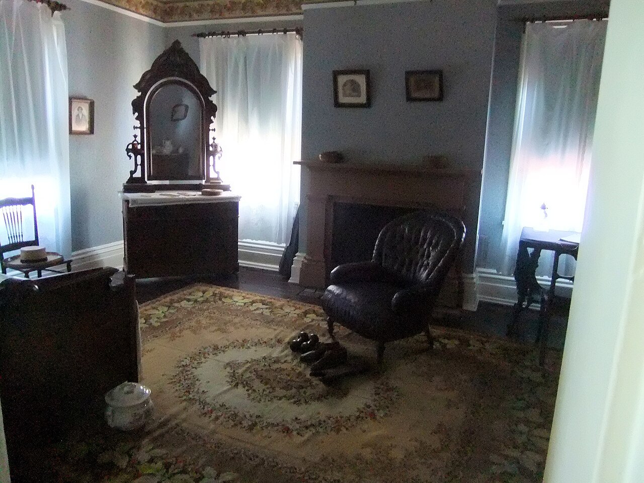 A bedroom at Cedar Hill, with a dressing table and armchair