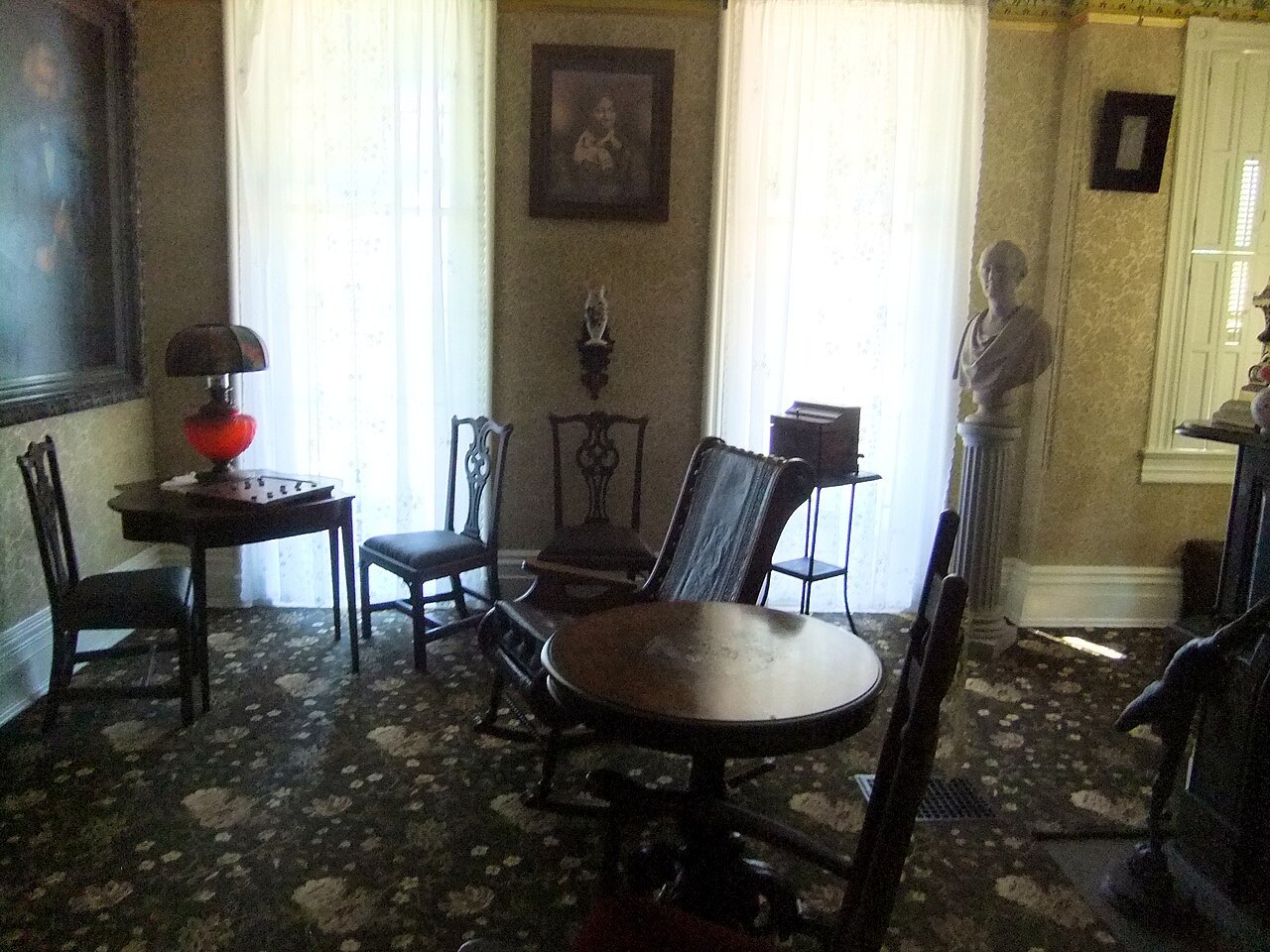 The sitting room at Cedar Hill, with Douglass family furniture and portraits