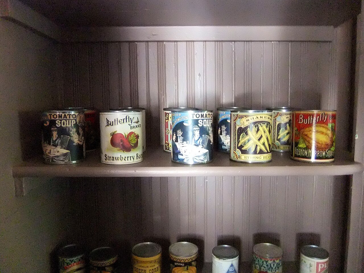 Tins and jars on the pantry shelves at Cedar Hill
