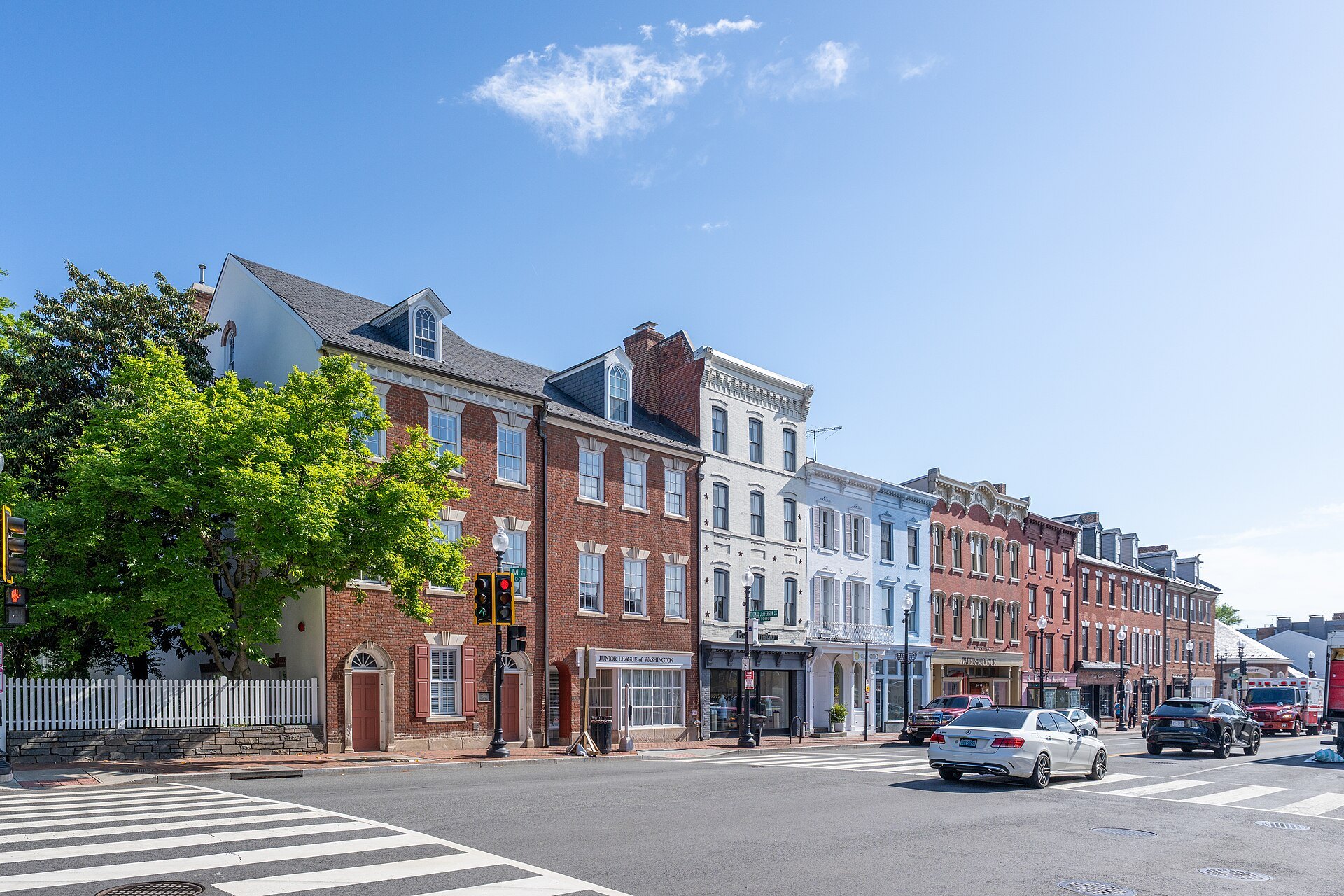 A row of Federal brick fronts on a Georgetown street corner