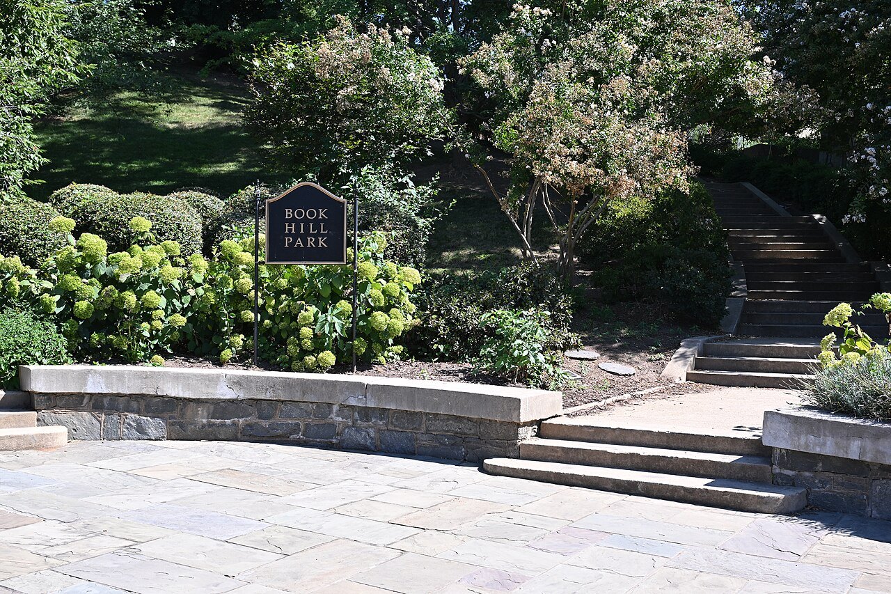 The steps of Book Hill Park rising behind its sign in upper Georgetown