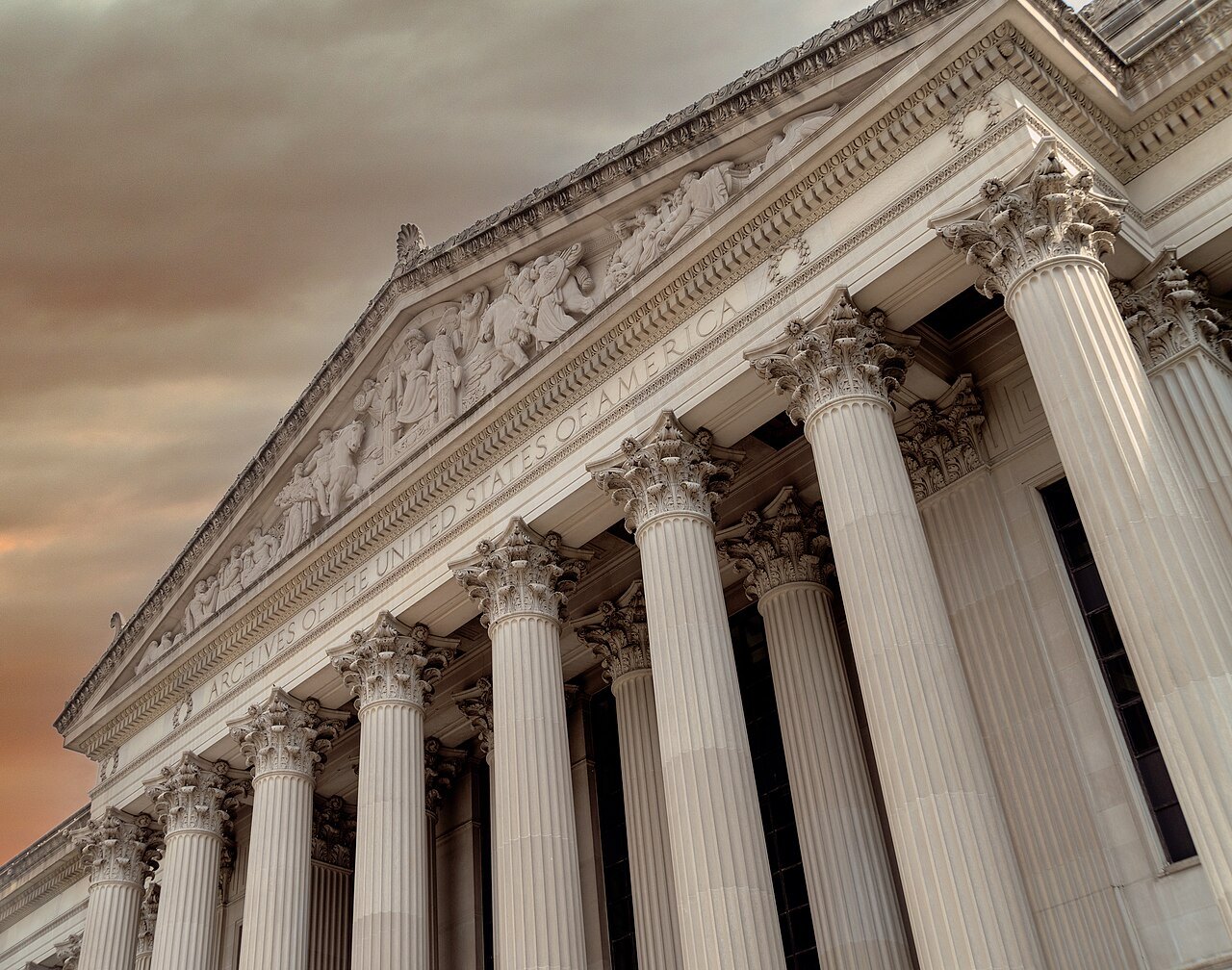 The Corinthian columns and pediment of the Archives' portico