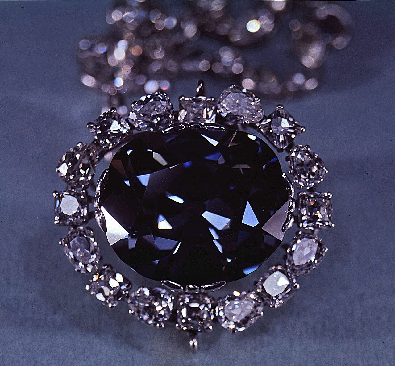 The Hope Diamond, blue within its ring of white diamonds