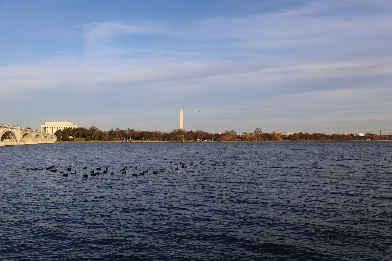 The Potomac at dusk, the Lincoln Memorial and the Monument on the far shore