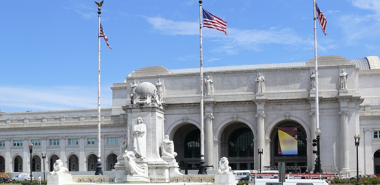 The Columbus Fountain in front of Union Station, flags above