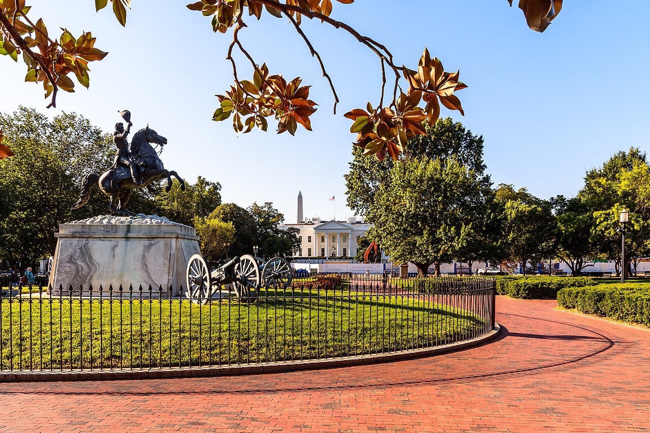 The Jackson statue and its cannon in Lafayette Square, autumn leaves overhead